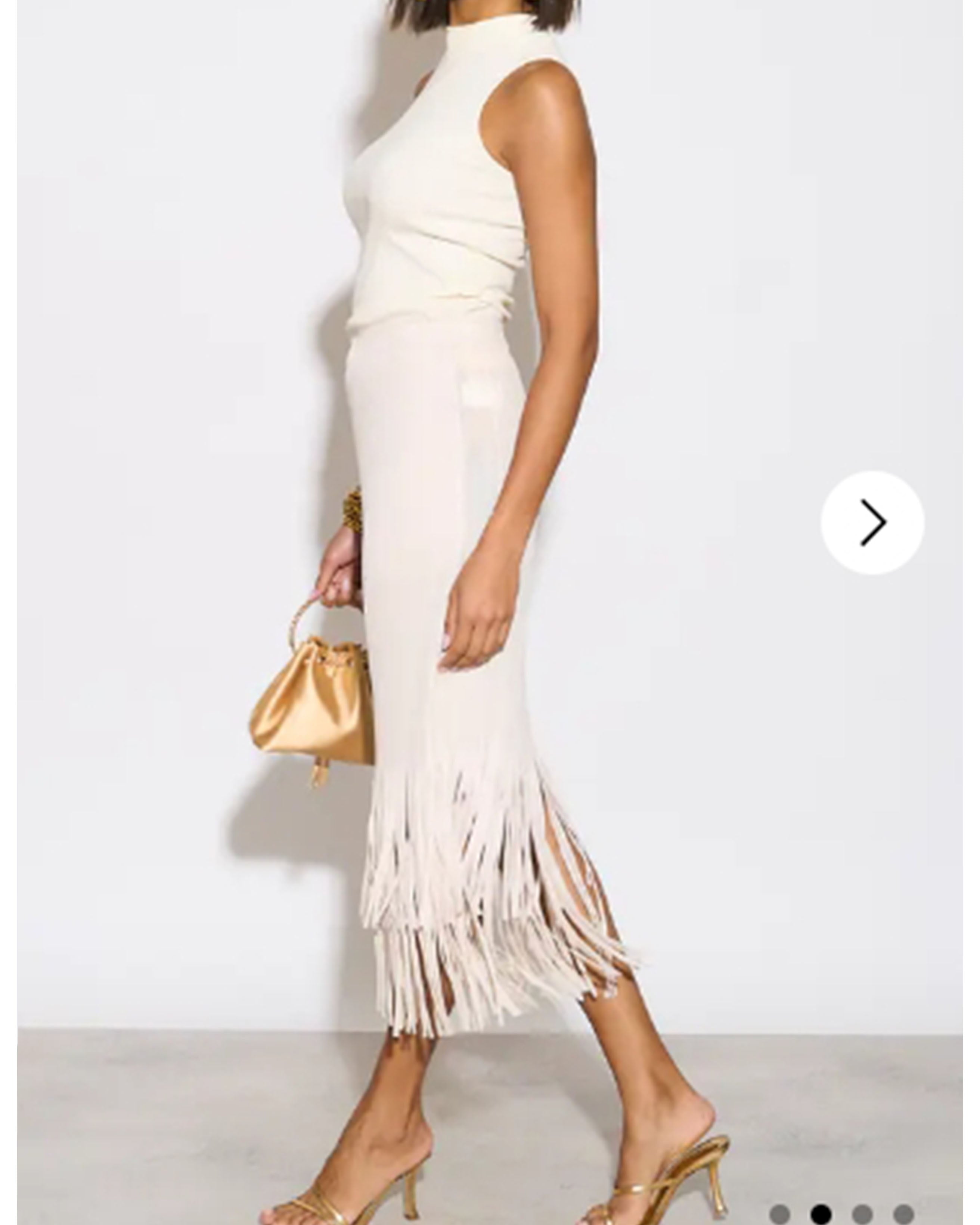 Olivia Row™ | Pleated Midi Skirt with multi fringed tassel hem design in White