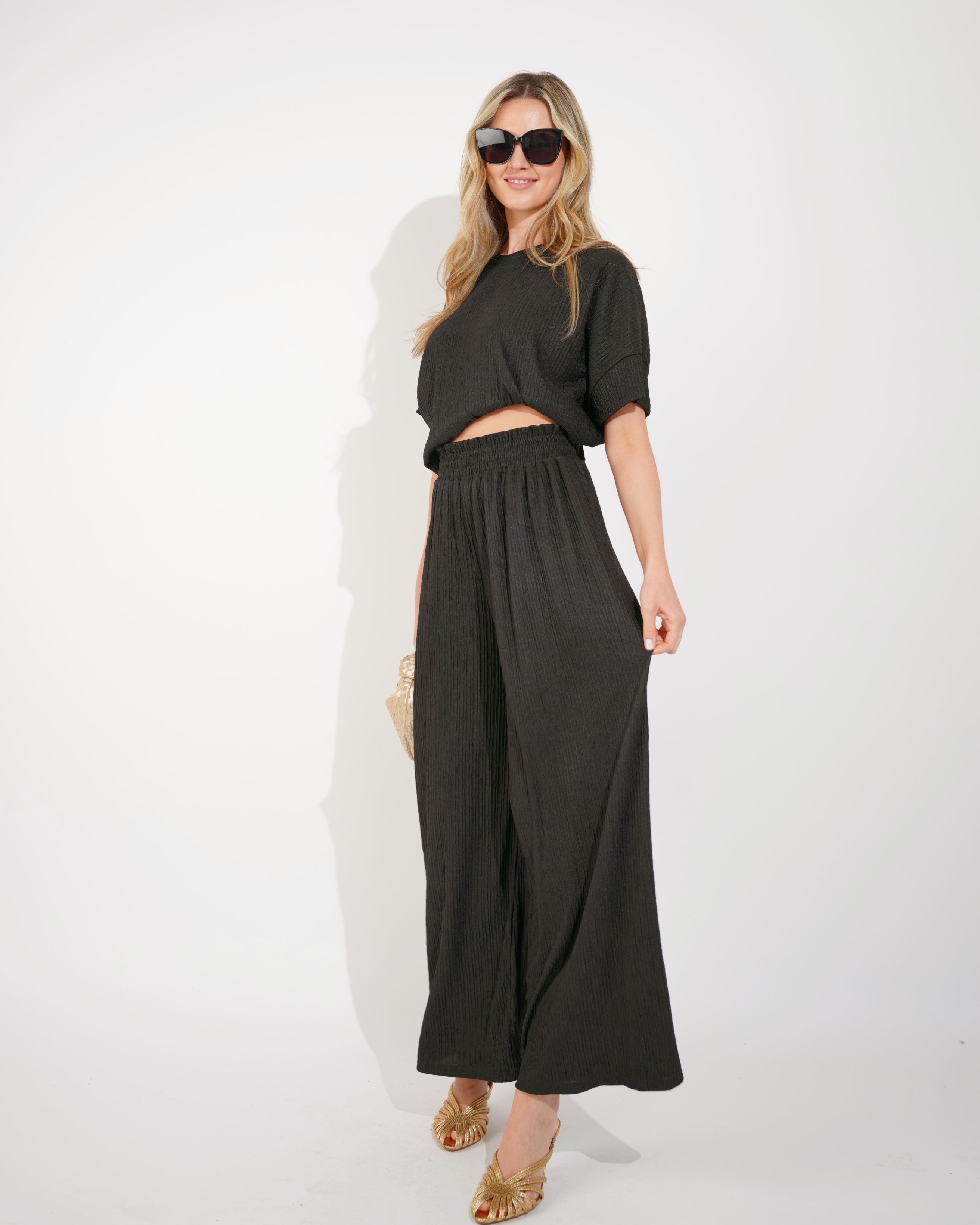 Olivia Row™ | Oversized comfort stretch-jersey top and Relaxed-fit trousers in Black
