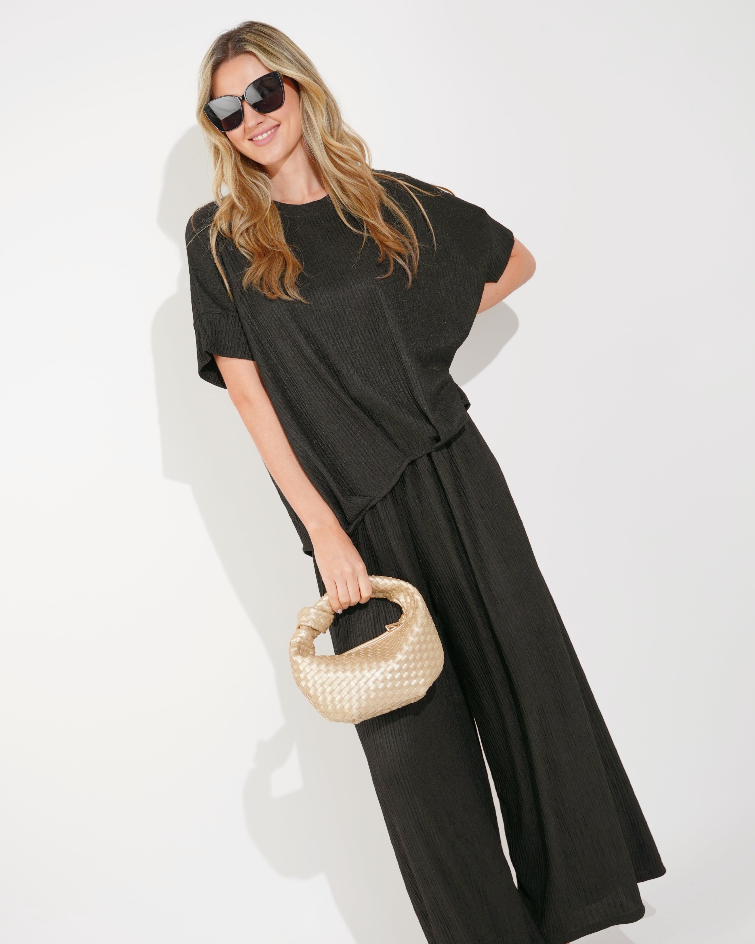 Olivia Row™ | Oversized comfort stretch-jersey top and Relaxed-fit trousers in Black