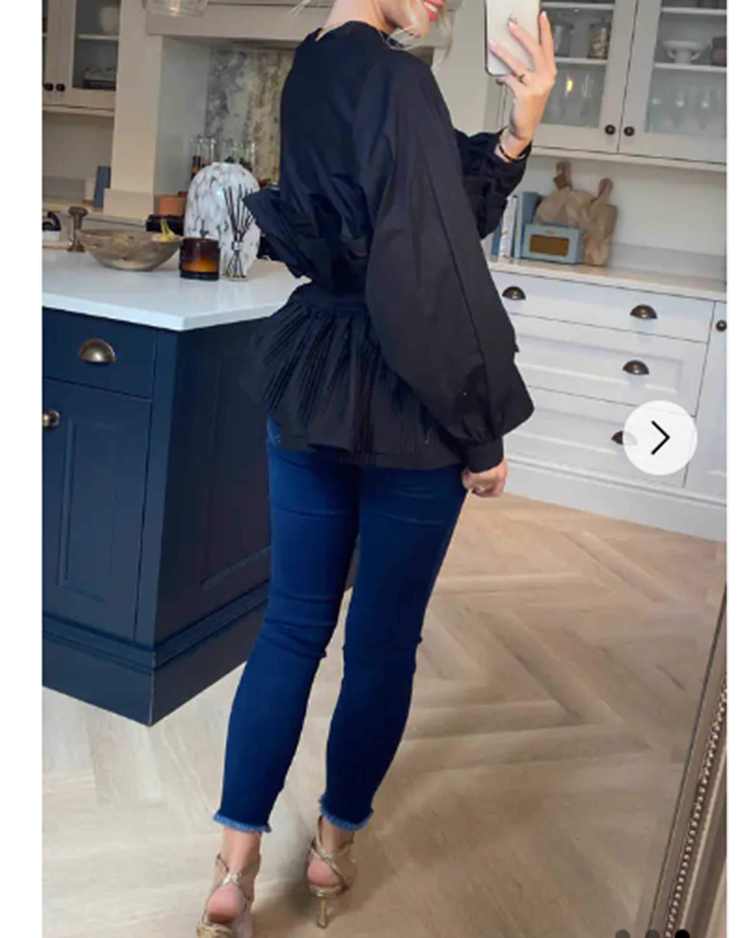 Olivia Row™ | Ruffle design around chest and hem cotton shirt in black